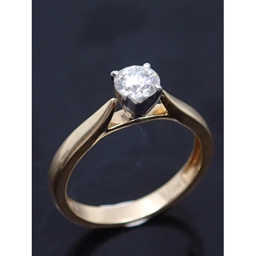 174 - A diamond solitaire ring set in 14kt gold with a copy of a valuation from Weir & Sons which states t... 