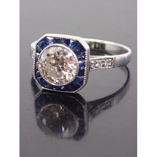 185 - A diamond & sapphire set ring set in 18ct gold, estimated weight of main diamond 1.20cts, I colour a... 