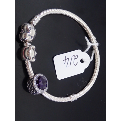 214 - A silver pandora charm bracelet