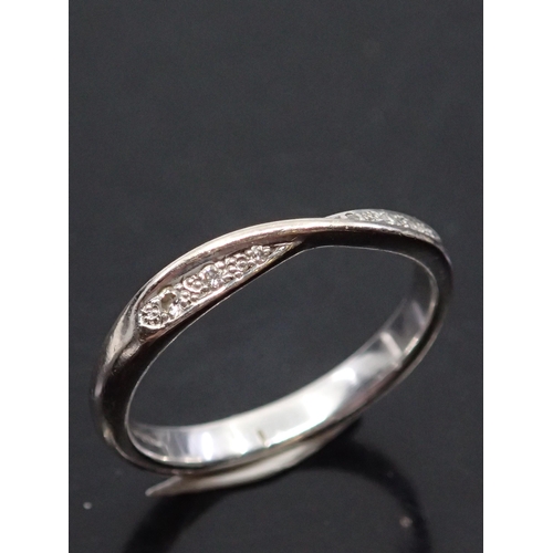 22 - A diamond set half eternity ring in 18ct gold finger size nearly N approx. 3.2 grams