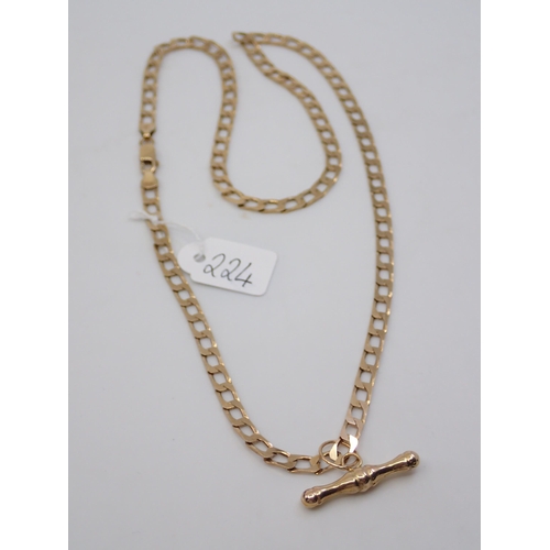 224 - A gold chain with a gold t-bar pendant approx. 13.4 grams