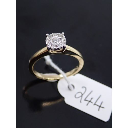 244 - A ladies gold cluster diamond ring finger size O