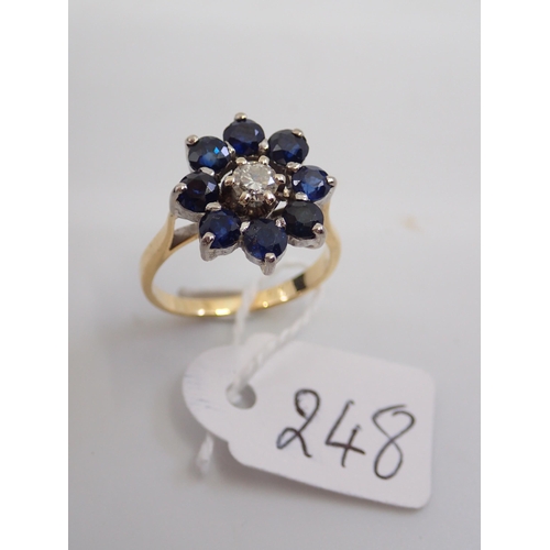 248 - An 18ct gold sapphire and diamond cluster ring finger size nearly K