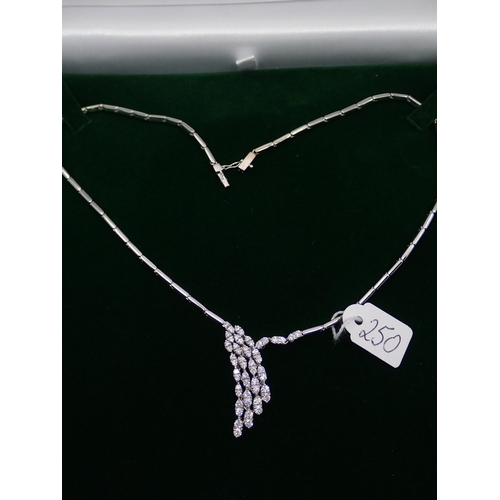 250 - An 18ct gold white gold diamond necklet, approx. 30.3 grams