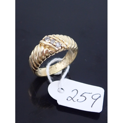 259 - A 14ct gold ring approx 7 grams finger size P