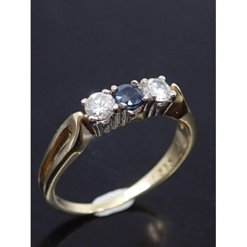 27 - A 14ct gold sapphire and diamond three stone ring, total estimated weight of diamonds 0.35cts and sa... 