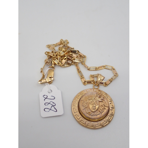 288 - An 18ct gold pendant and chain, total weight approx. 14.9 grams