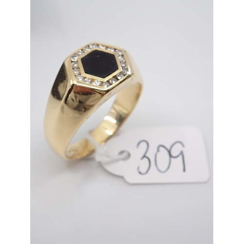 309 - Gents 18ct gold diamond ring, approx. 12.4 grams finger size W