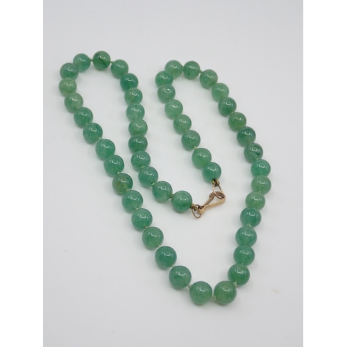 313 - A gem set necklace (9ct gold clasp) (To be sold on the instructions of St Vincent De Paul)