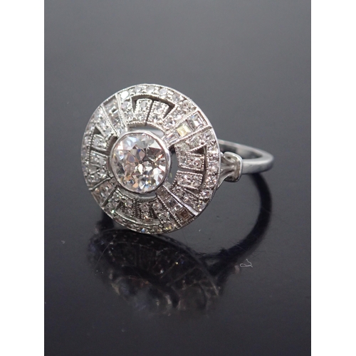 315 - A diamond star burst cluster ring, estimated weight of main diamond 1ct, colour H clarity Si1, finge... 