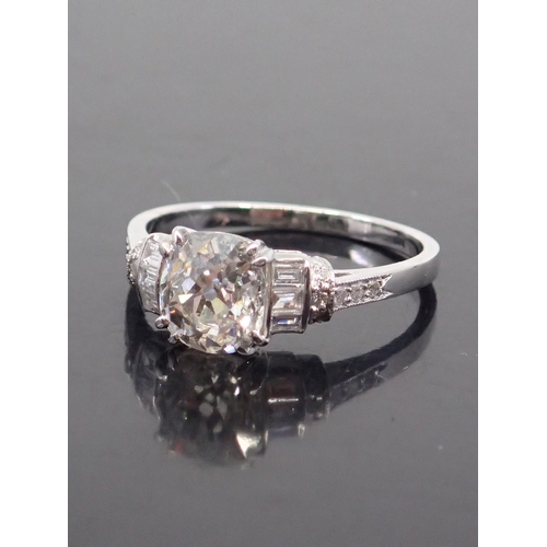 319 - A diamond solitaire ring, set with diamond shoulders, with a HRD certificate which states the diamon... 