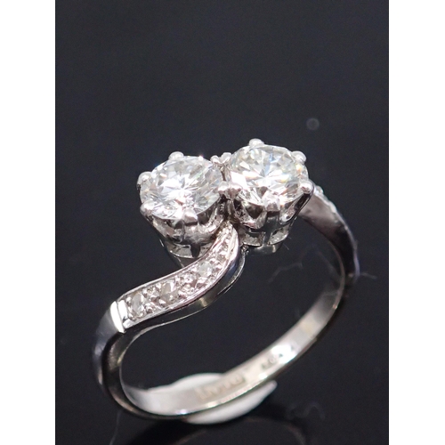 324 - A diamond two stone twist ring, estimated weight of diamond 0.90cts F/G colour and VS clarity, finge... 