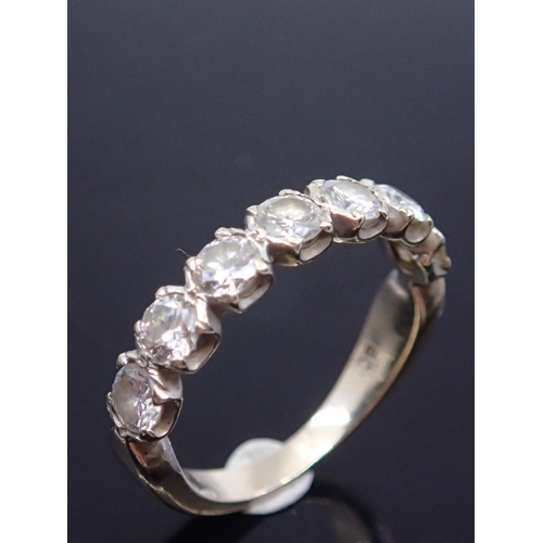 329 - A diamond half eternity ring set in 18ct gold  finger size K half