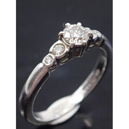 37 - A diamond set ring set in platinum finger size M