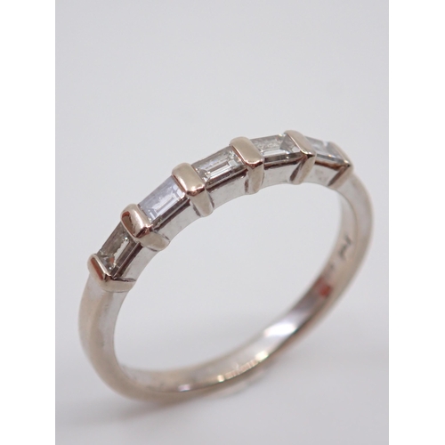 55 - A diamond half eternity ring set in 18ct with a copy of valuation which states the weight as 0.39cts... 