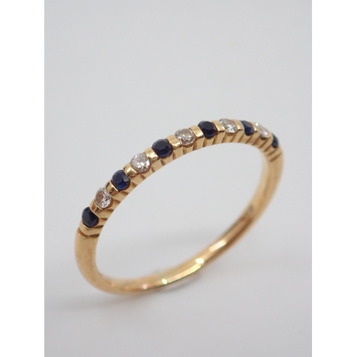 61 - An 18ct gold diamond and gem set ring approx. 1.4 grams