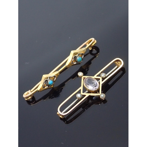 69 - Two gold gem set brooches approx. 5.9 grams