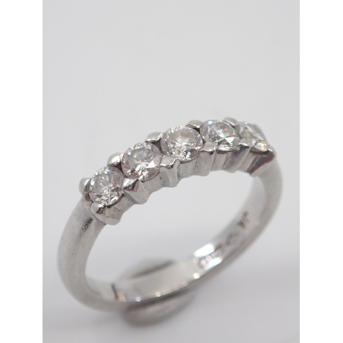 7 - A diamond set 5 stone ring set in platinum finger size G approx. 4 grams