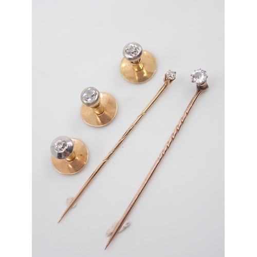 82 - A collection of diamond set dress studs and diamond set stick pins, total weight approx. 7.5 grams