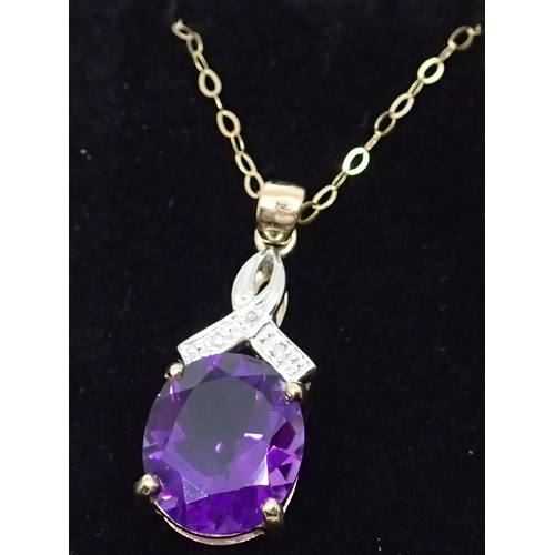 97 - A gold diamond and amethyst pendant and chain