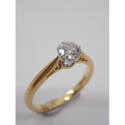 8 - A diamond solitaire ring set in 18ct gold, estimated weight of diamond 0.57cts finger size M