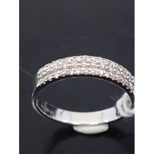 58 - A diamond cluster ring, showing as finger size M and a half