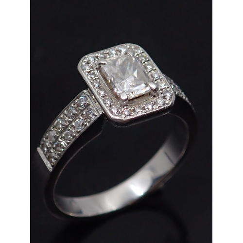 71 - A fine diamond cluster ring set in platinum, with Valuation from Keanes which states the diamond cen... 