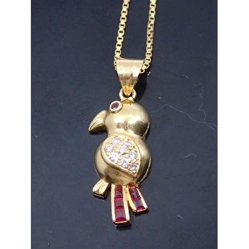 75 - An 18ct gold diamond and gem set bird pendant on chain approx. 7.9 grams