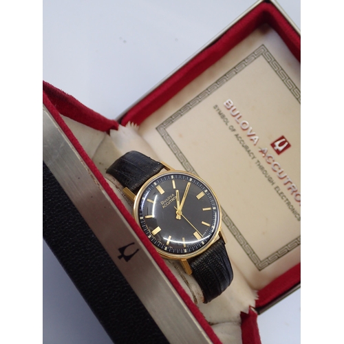 305 - A bulova accutron watch in box