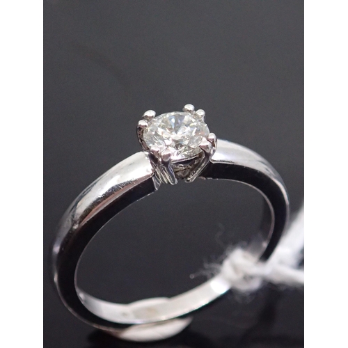 31 - A diamond solitaire ring set in 18ct gold, estimated weight of diamond 0.50cts finger size M Half