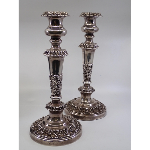 357 - A pair of silver plated candlesticks approx. 11.5 inches high