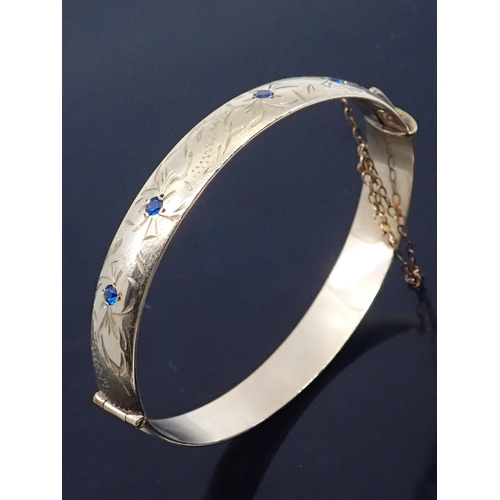 187 - A gem set bangle