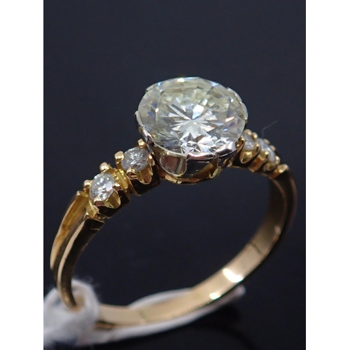 20 - A diamond solitaire ring set in 18ct gold, estimated weight of main diamond 1.25cts, finger size K