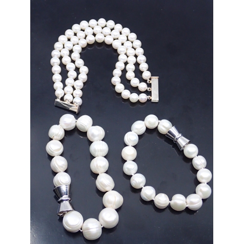 308 - Three fresh water pearl bracelets