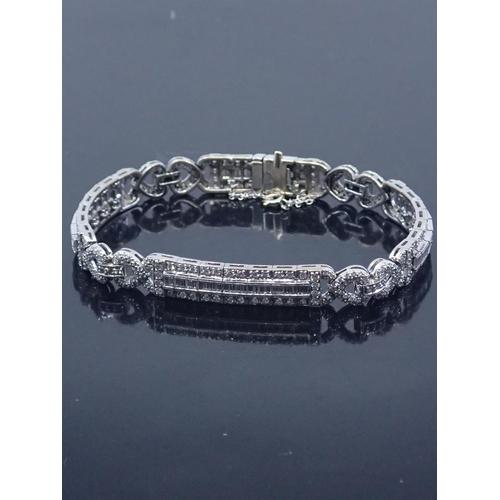 107 - A diamond set bracelet approx. 23 grams set in 18ct gold length 7 inches