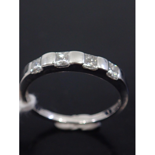 35 - A diamond half eternity ring, showing as finger size M