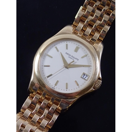 Patek Philippe Calatrava 18ct gold wrist watch in box and with papers ...