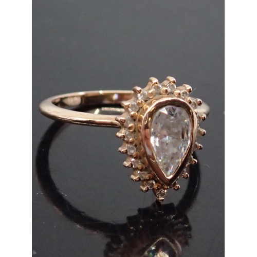 141 - A 18ct gold cluster moissanite ring