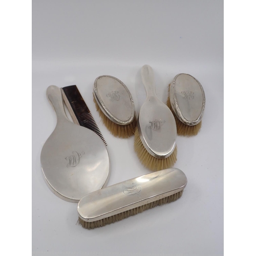 365 - Silver mounted hand mirror, brushes etc