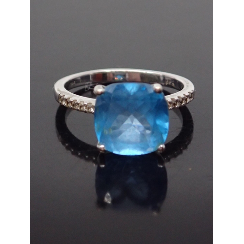 44 - A diamond and gem set ring,  showing as finger size M
