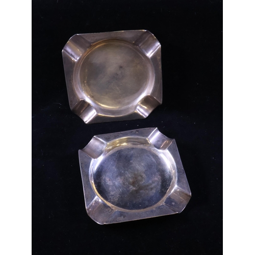 162 - A pair of silver ash trays approx. 93 grams