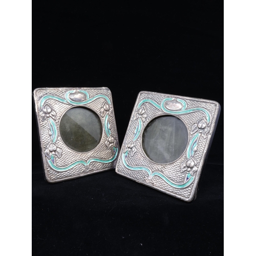 206 - A pair of sterling photo frames, stamped Sterling ?915