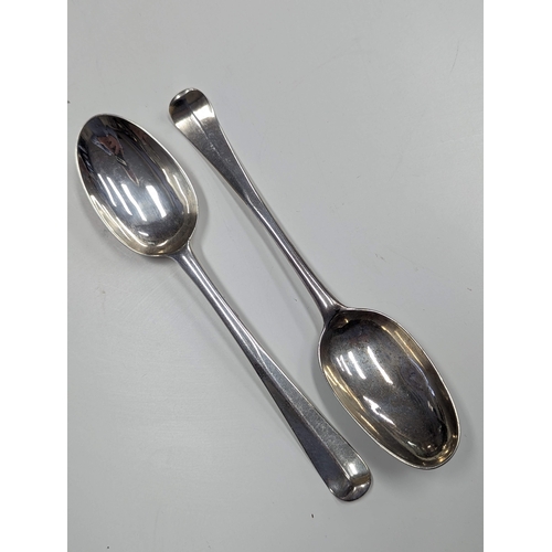 31 - Two early Irish silver tablespoons by David King Dublin circa 1720 to circa 1730 total weight approx... 