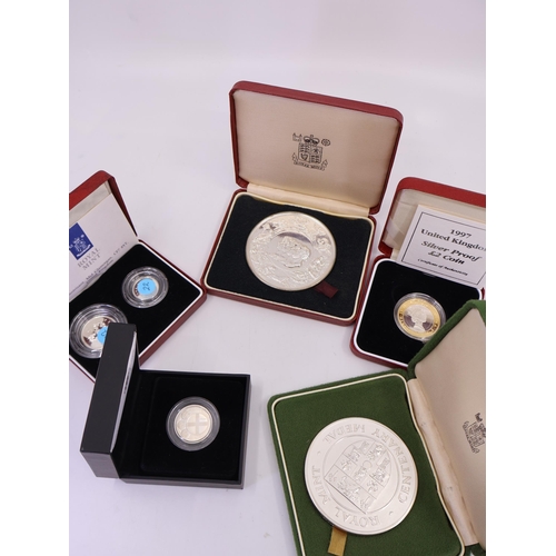 504 - A collection of coins and medallions including   two large silver medallions (approx. 153 grams and ... 