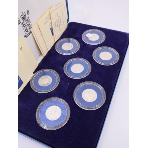 511 - A boxed set of 7 silver coins 'Â£1 Silver Proof'