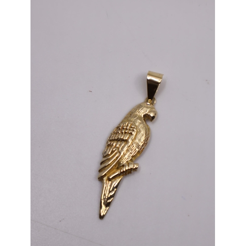 87 - A 14ct gold parrot pendant