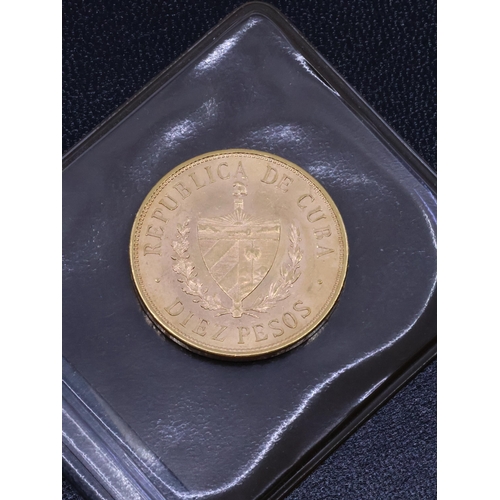 395 - A Cuba 10 Pesos gold coin approx. 16.7 grams