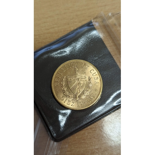 395 - A Cuba 10 Pesos gold coin approx. 16.7 grams