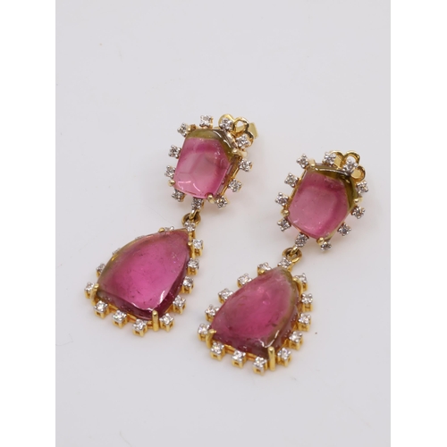 53 - A pair of pink tourmaline and diamond cluster earrings set in 14kt gold