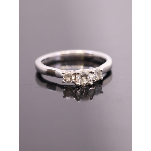 158 - A diamond three stone ring, total estimated weight of diamonds 0.55cts finger size M